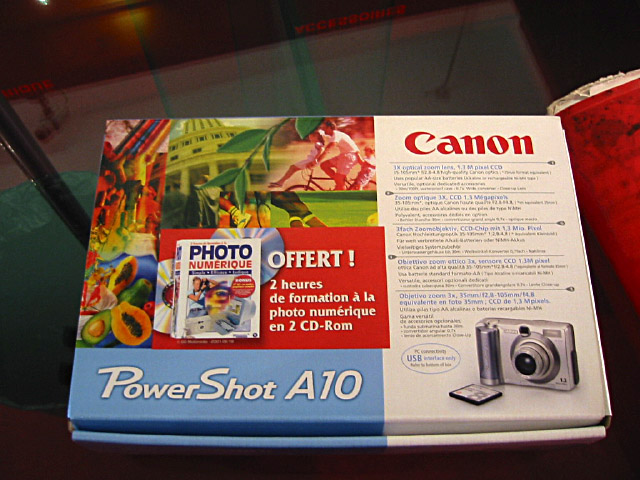 J'achète un appareil photo Canon. Le Konica est trop mauvais