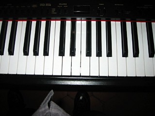 Je joue un peu de piano