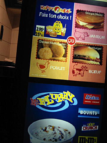 Nous avons faim. Nous allons prendre du Mac Do à emporter