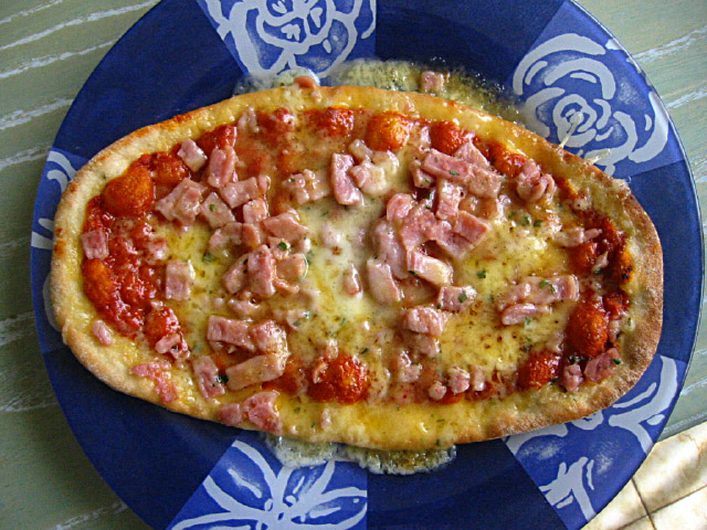 Je mange une pizza