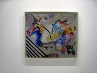 Je visite l'exposition. Il est interdit d'y prendre des photos
