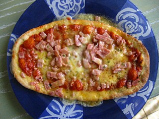 Je mange une pizza