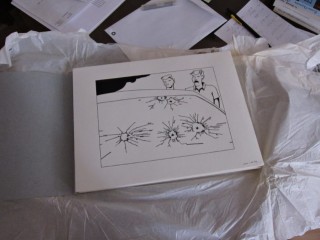 Édouard me donne un de ses dessins. Je les regarde afin de choisir